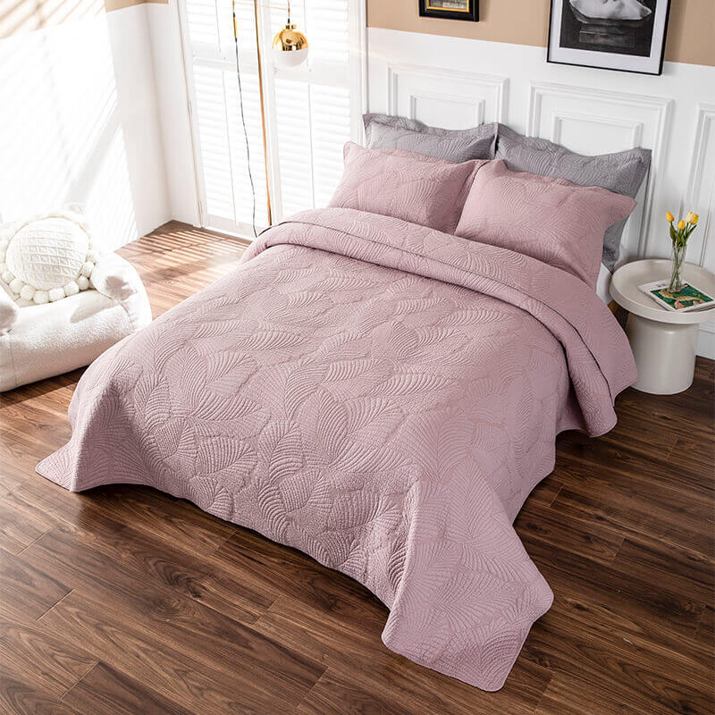 Juego de cama minimalista de algodón de lujo de tres piezas con bordado de hojas de color liso y doble cara, estilo europeo.