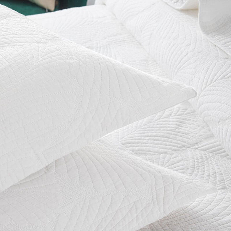 Juego de cama minimalista de algodón de lujo de tres piezas con bordado de hojas de color liso y doble cara, estilo europeo.