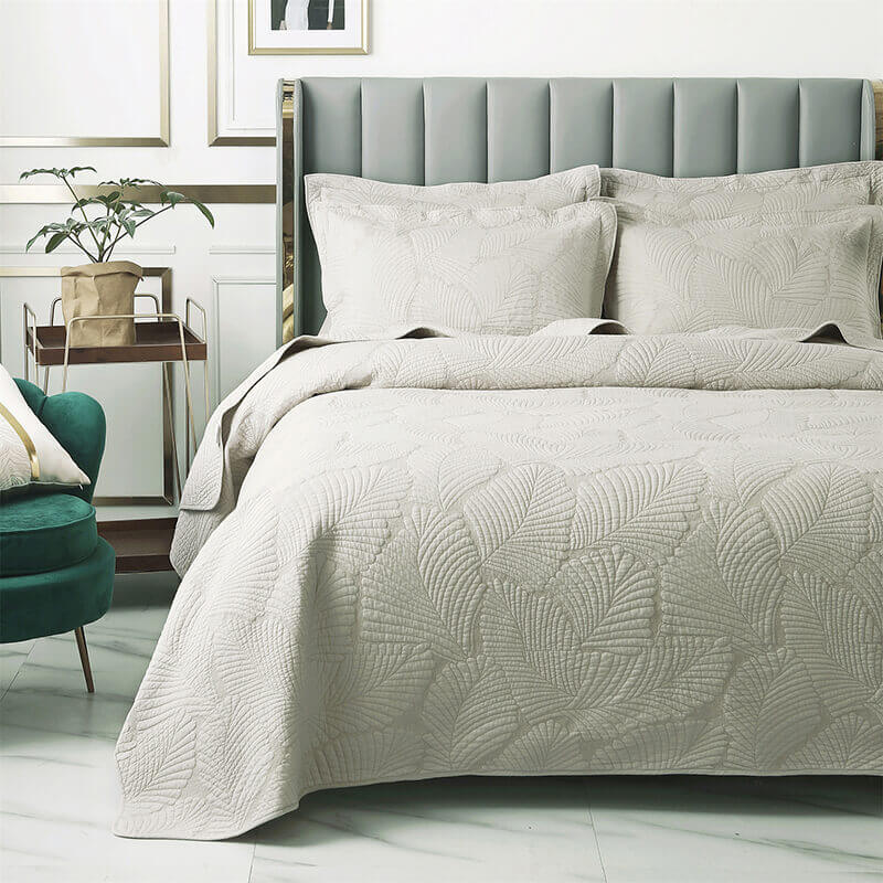 Juego de cama minimalista de algodón de lujo de tres piezas con bordado de hojas de color liso y doble cara, estilo europeo.