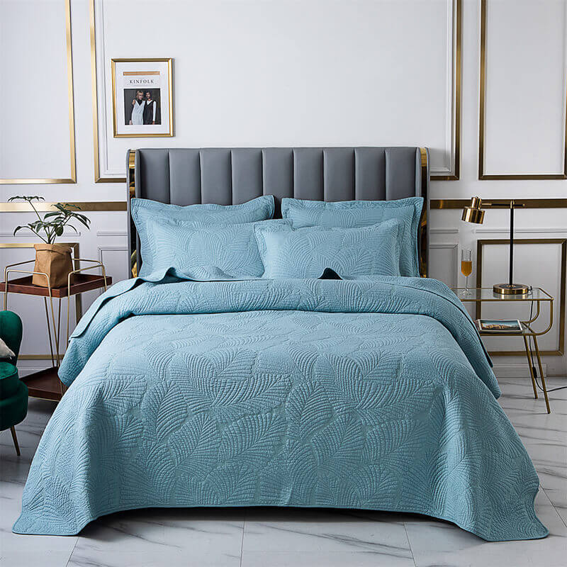 Juego de cama minimalista de algodón de lujo de tres piezas con bordado de hojas de color liso y doble cara, estilo europeo.
