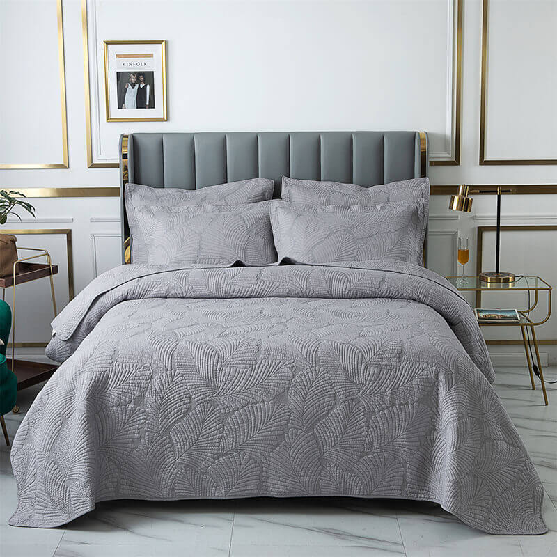 Juego de cama minimalista de algodón de lujo de tres piezas con bordado de hojas de color liso y doble cara, estilo europeo.